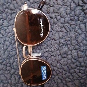 Limited edition boy Champion flipped up shades to glasses.